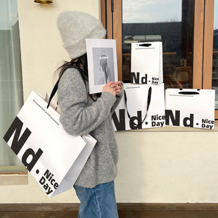 服装店手提袋定制网红肩背购物纸袋包装衣服袋子手拎口袋定做