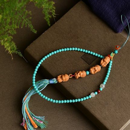 极速檀香四不佛手机链 菱镁矿圆珠 手工流苏 ZDM406