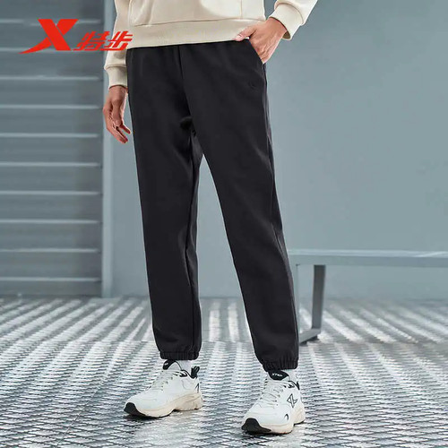 特步女子冬季梭织运动长裤加绒