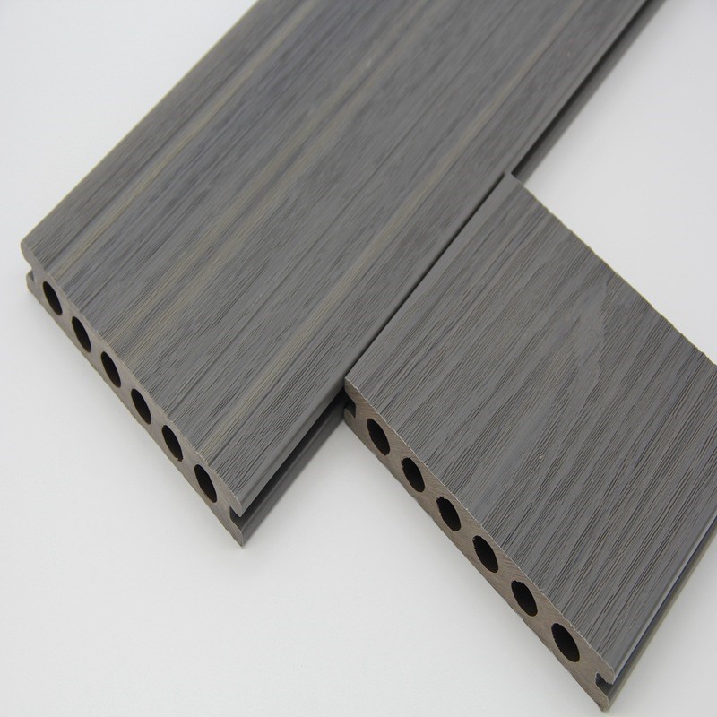 供应木塑二代共挤圆孔塑木地板拼接木纹木塑室外露台花园庭院地板