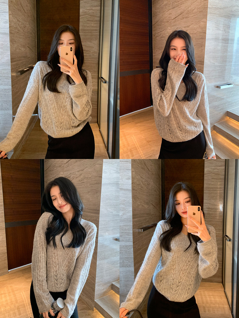 Model wearing a light gray knitted sweater in mirror selfies