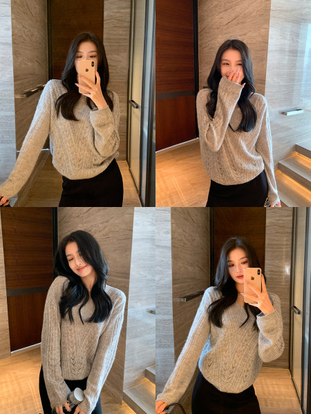 Model wearing a light gray knitted sweater in mirror selfies