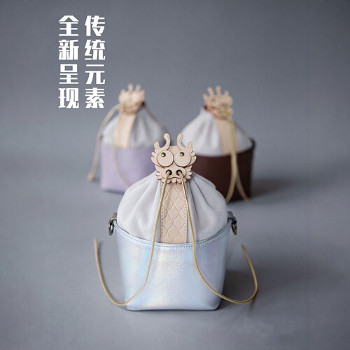 与吉YUJI国风鼻涕龙水桶包新款
