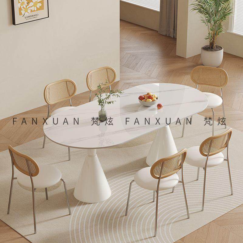 梵炫白色岩板奶油风餐桌椅组合北欧现代简约家用小户型椭圆形桌子
