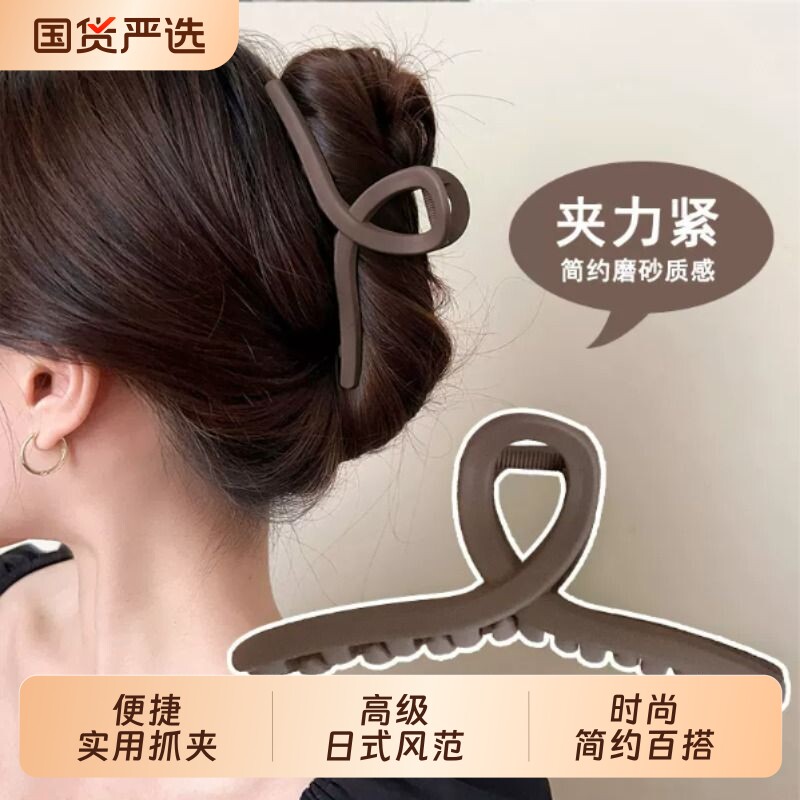 新款黑色抓夹款盘发夹量多时尚图片