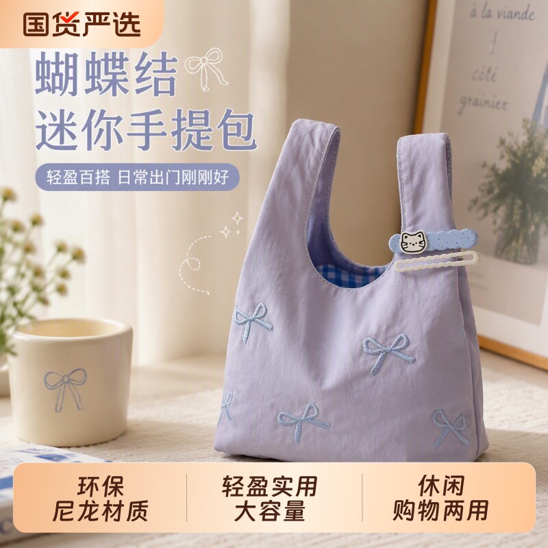 蝴蝶结简约刺绣迷你帆布包夏季百搭大容量通勤手拿包手提尼龙蓝色