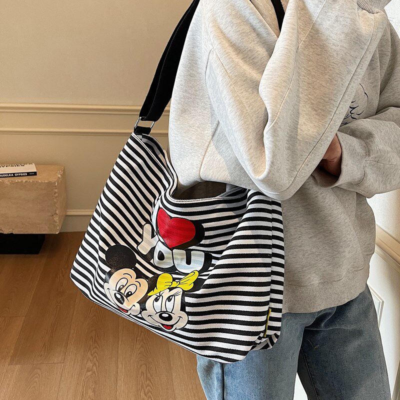 卡通条纹帆布包女2025新款大学生上课通勤包休闲大容量斜挎托特包