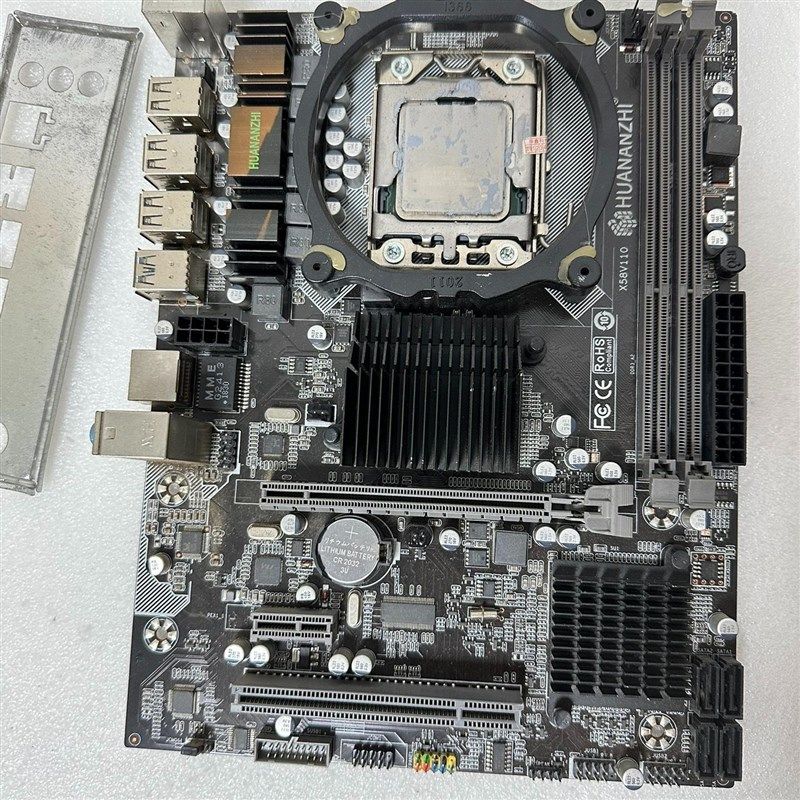 华南X58主板 已经测试完好 有挡板 带图片上的CPU。