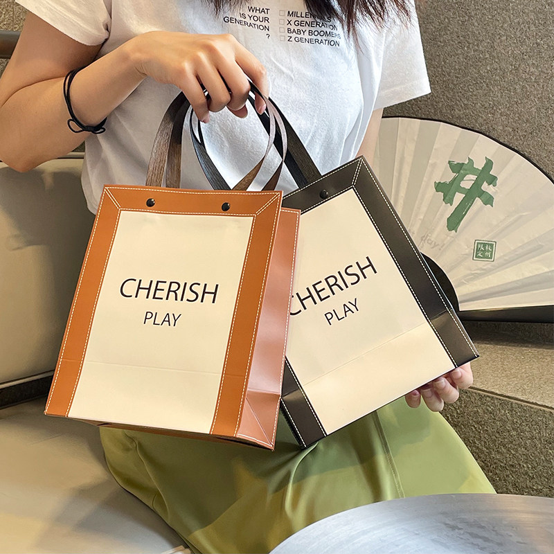 速发服装店手提袋个性礼品购物包装纸袋装衣服袋子印刷