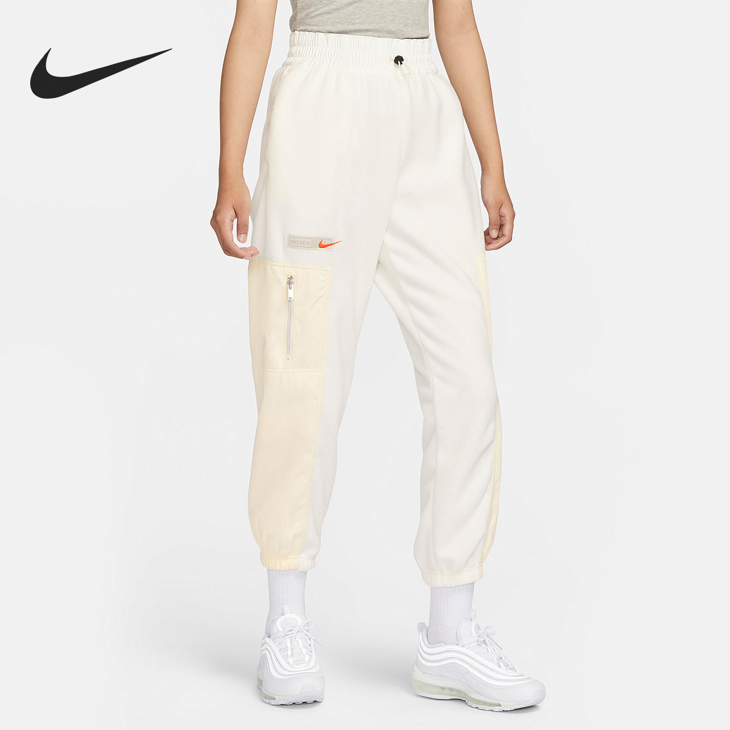 Nike/耐克官方正品秋冬女士保暖休闲拼接宽松束脚长裤FB8682-133