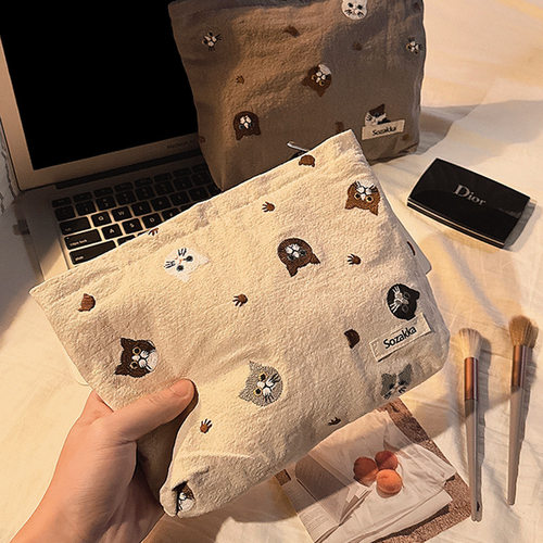 外出手拿包2025新款大容量旅行