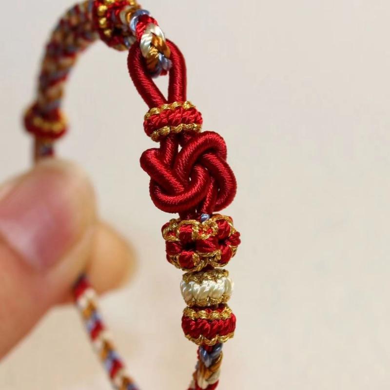 diy红彩色绳手链手工编织桃花手链