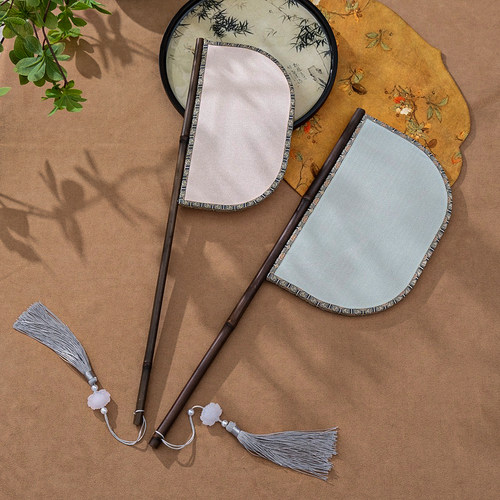 季晴雪仿缂丝长柄紫竹刀扇