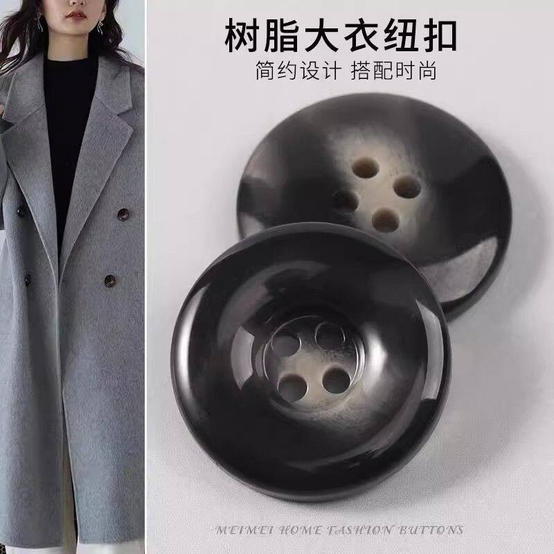 高档亮光纽扣大衣女扣