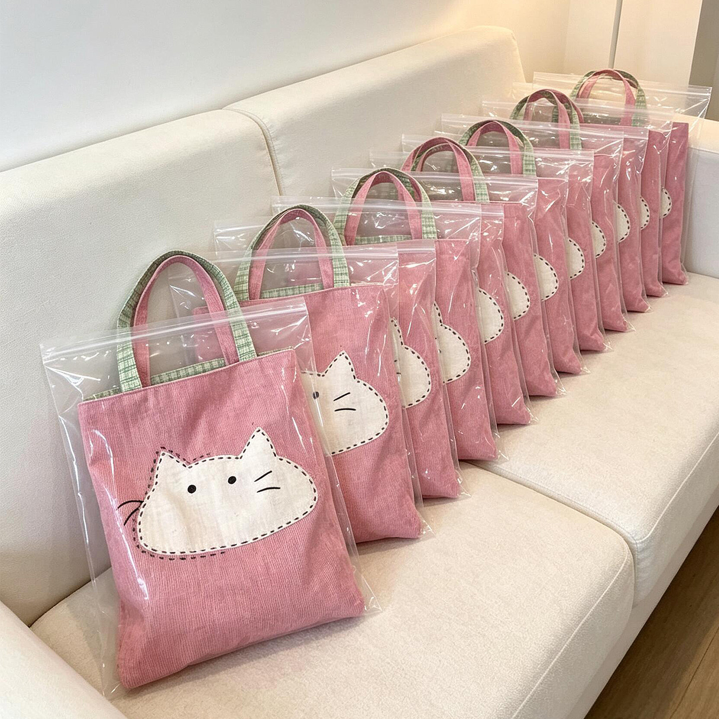 可爱猫咪帆布包女款2026新款大容量上班通勤手提单肩包手拎包百搭