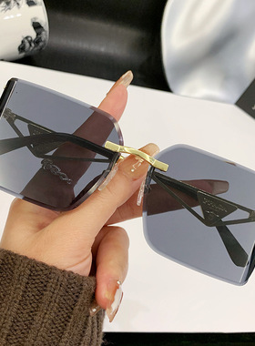 欧洲站新款镂空无框太阳镜大方框高级欧美金属墨镜切边曲面遮阳女