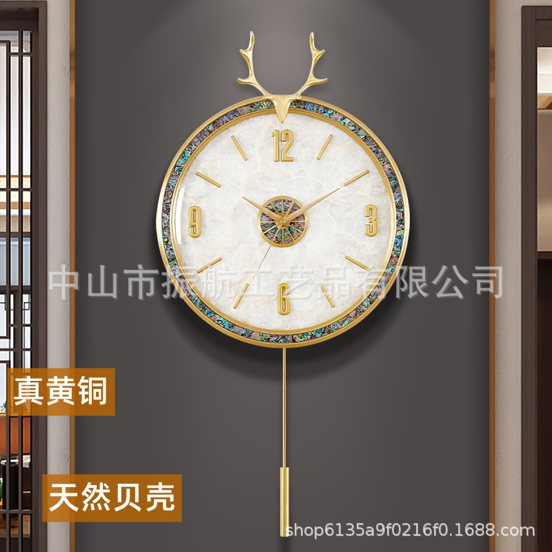 厂家批发新款贝壳轻奢钟表挂钟客厅家用时钟挂墙挂表简约网红石英