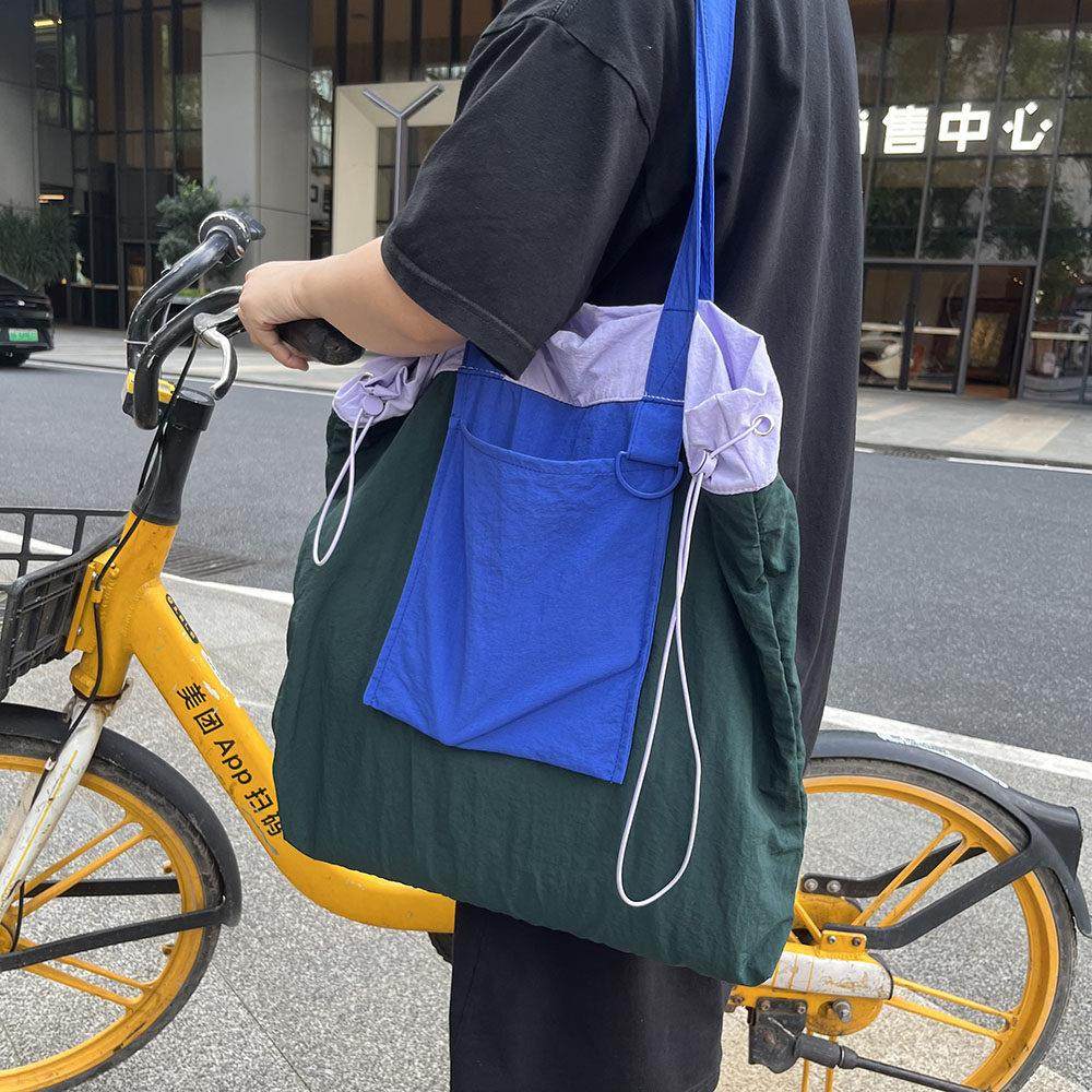 大容量可折叠时尚抽绳束口购物袋防水撞色尼龙布2024新款单肩包女,箱包皮具/热销女包/男包,时尚帆布包,淘宝优惠券,粉丝福利购,淘宝优惠卷