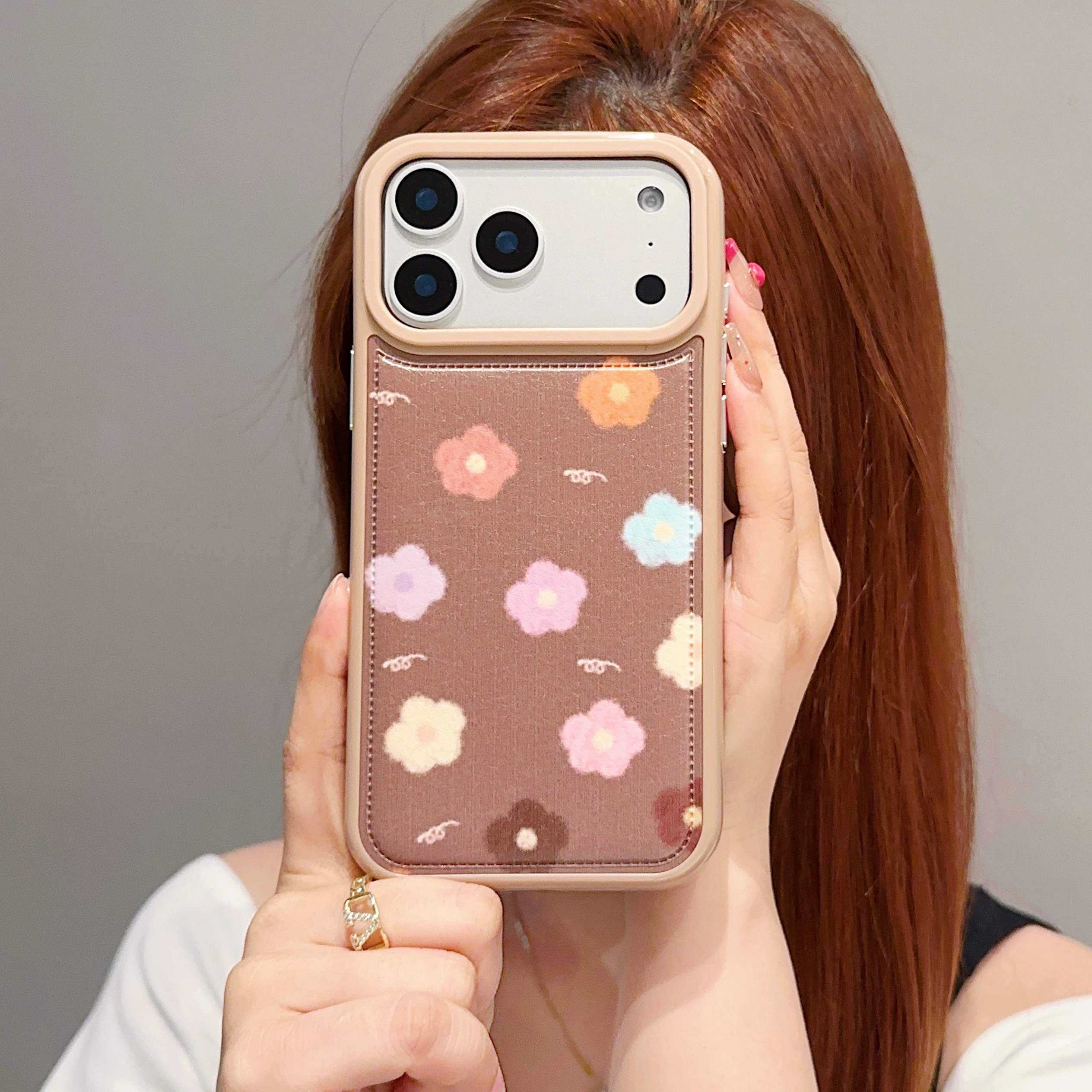 鼓包皮纹棕色花朵适用iPhone17promax手机壳苹果16气囊防摔15防指纹14碎花女秋冬新款软边硬背硅胶边保护套pm