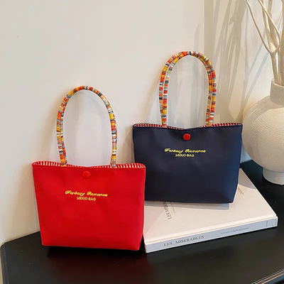 可爱精致手提包包百搭吸睛通勤拎包撞色便携补妆外出随身便携