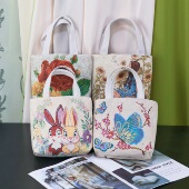 新款 可爱双面刺绣帆布手提包拉链外出百搭上班小拎包便携手机包