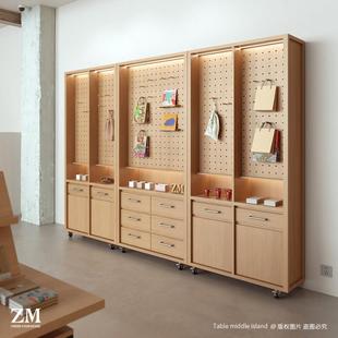 洞洞板立柜文创店书店壁柜靠墙旅游产品展示柜简约商品陈列架定制