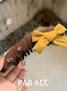 韩国东大门美拉德黄色蝴蝶结扭扭夹精致水钻字母懒人顶夹香蕉夹子