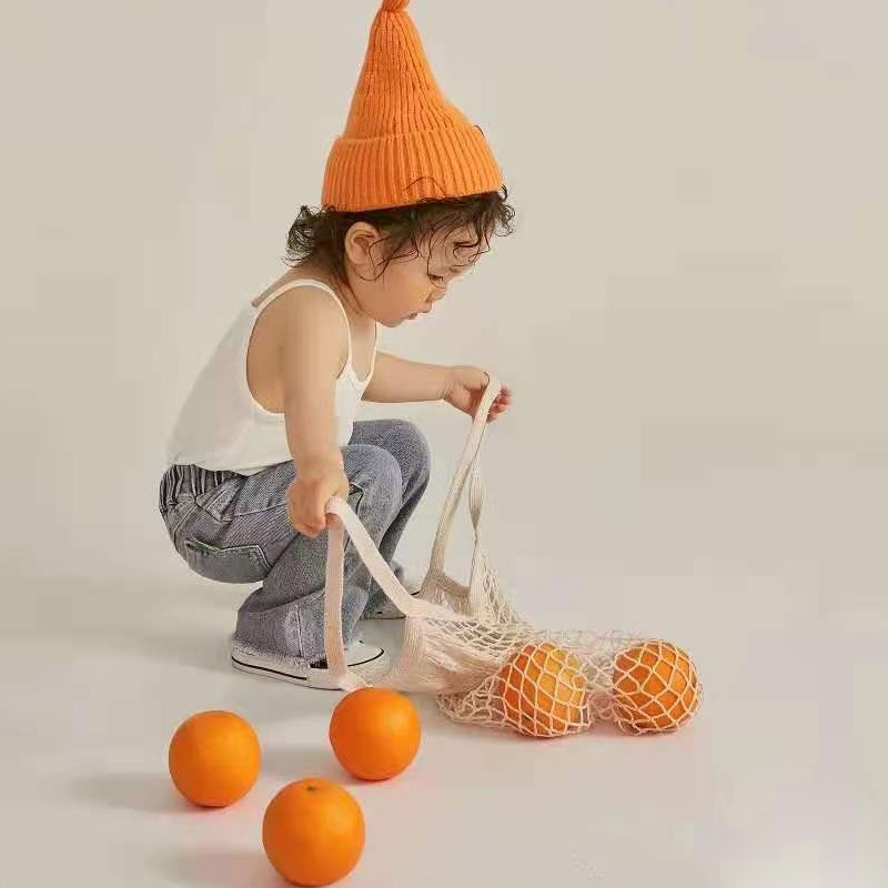 速发周岁儿童拍手影楼摄影室内实景摆拍创意照拿橙子道桃樱具