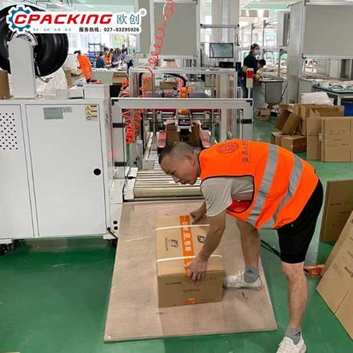 大型机械纸箱打包流水线重型物品打包封箱设备束带捆扎机