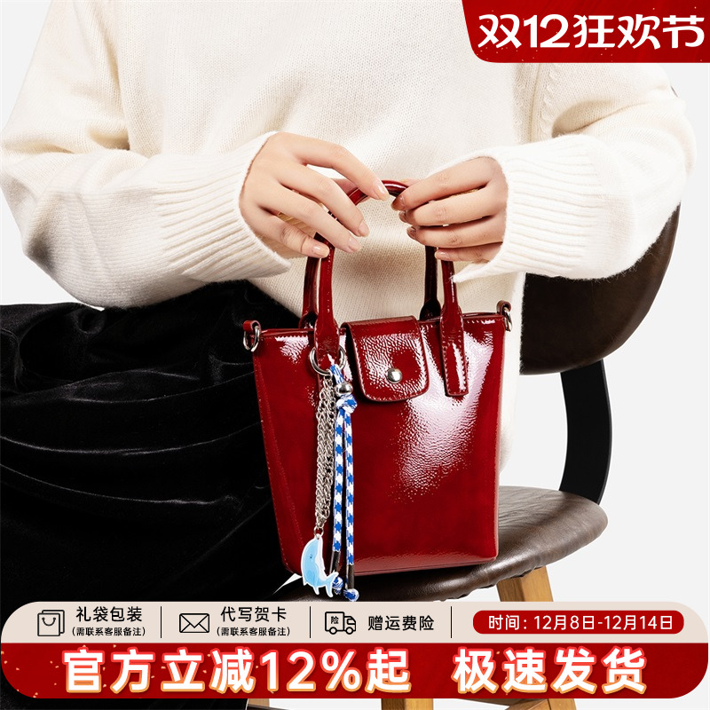 天美意真皮水桶包女2025新款