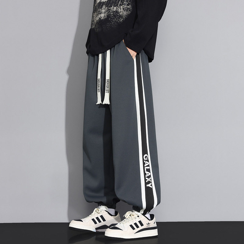 裤子男款2025新款宽松束脚休闲长裤男青少年复古条纹拼接运动卫裤