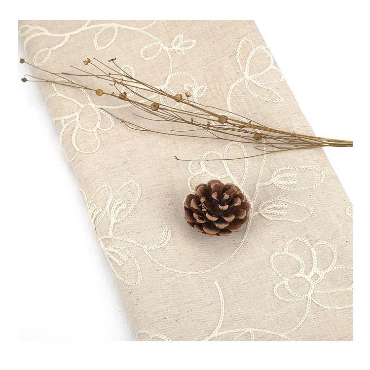 麻薄款棉麻绣花绣面料亚布KHN绣花布料平纹棉麻花连衣裙衬衫面料