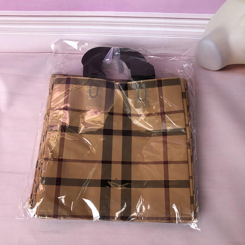好货定制化妆品手提袋服装店杏格子塑料袋包袋商用购物袋大简约打
