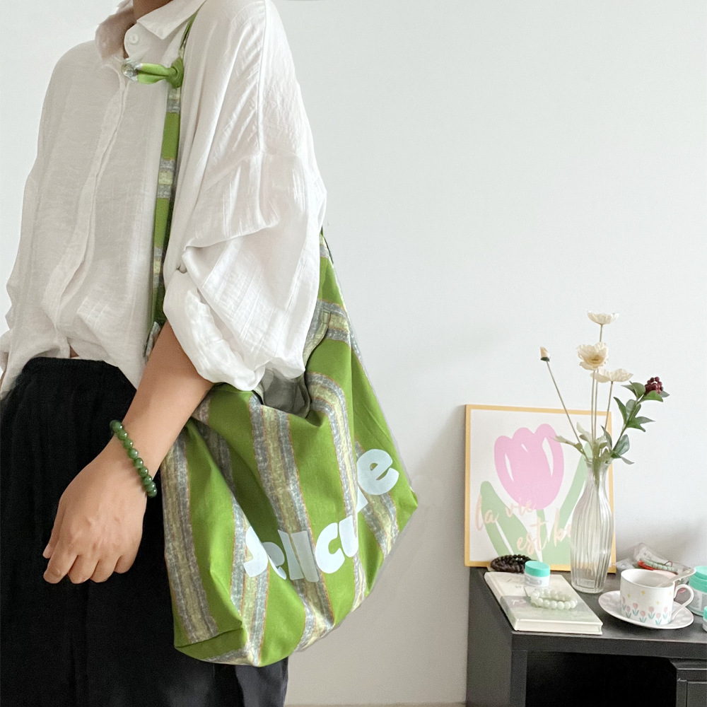 日本品质新款小众法式果绿条纹撞色帆布包手拎单肩斜挎多用包薄款