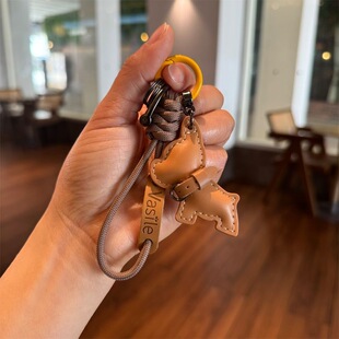 编织伞绳钥匙扣奶嘴挂绳链包包挂件高级皮质挂饰防丢便携车钥匙扣