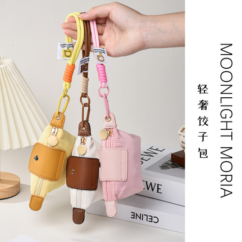 迷你小包包～出片小能手～2025轻便饺子包手腕挎包女耳机零钱包