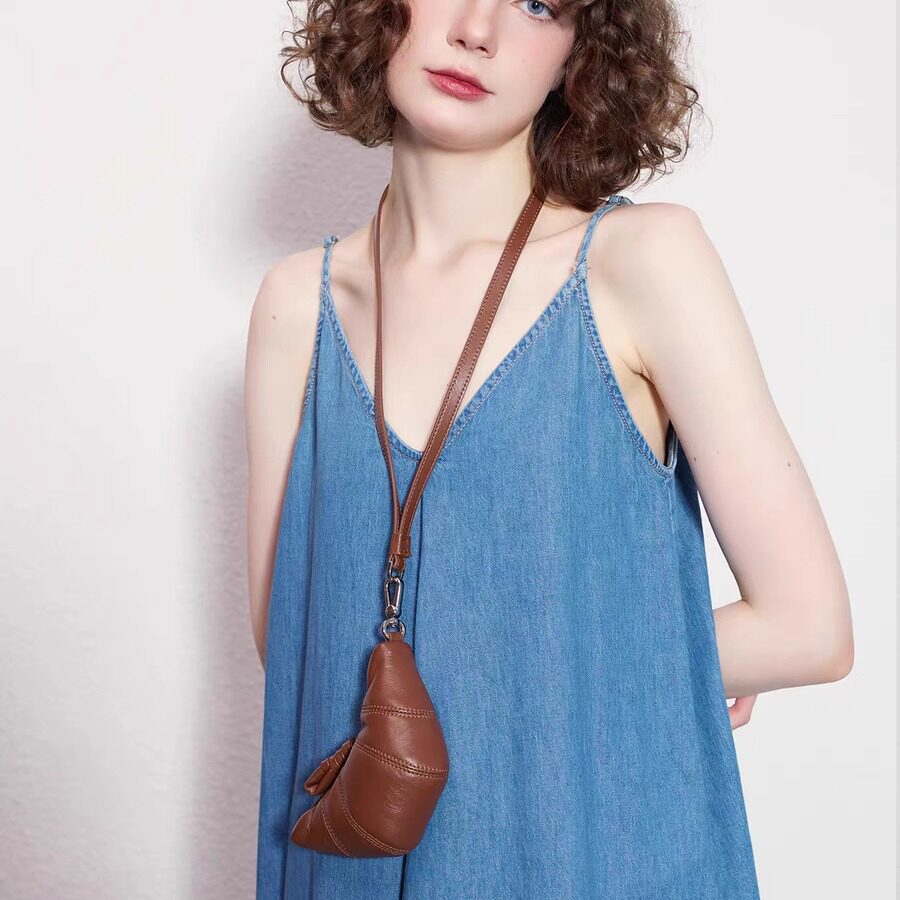 挂绳牛角包挂脖小包饺子包斜挎钥匙耳机包单肩包真皮质感零钱包