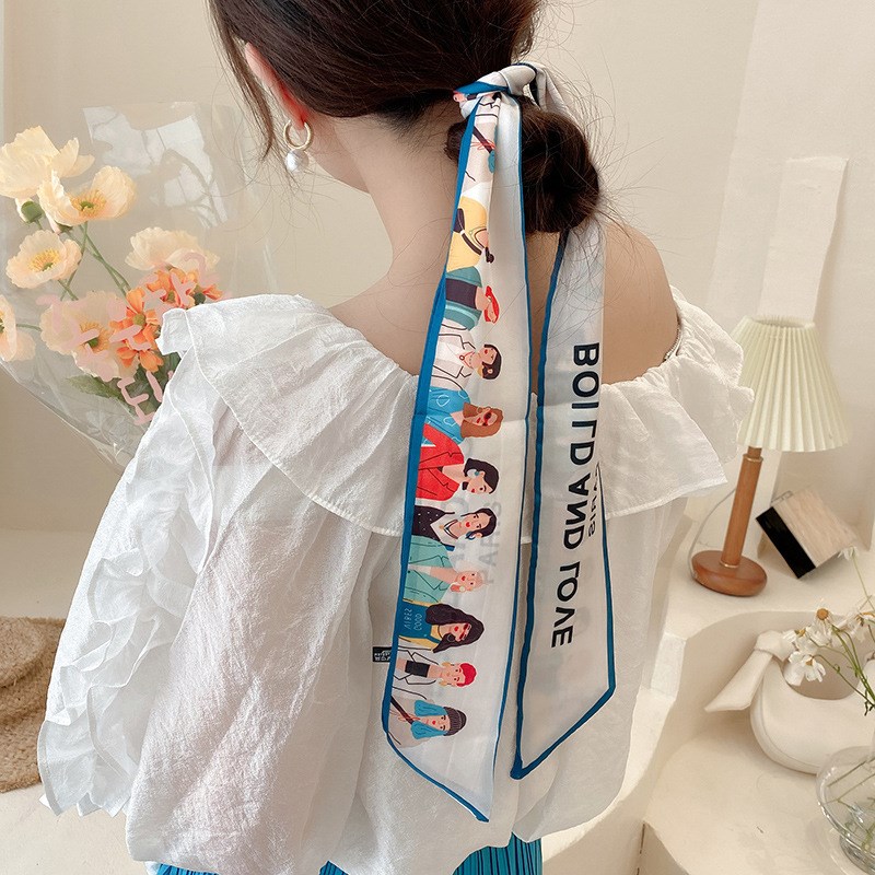 In silk hair ribbon strip length of hair and distribute