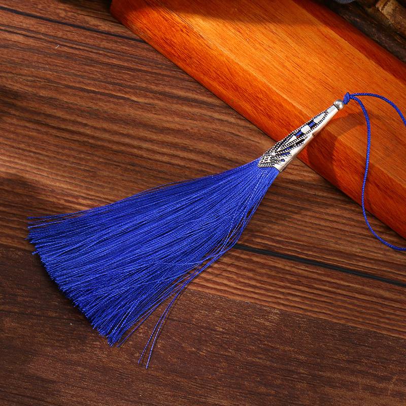 New hollow metal hat tassel cone hat hollow phoenix tail tas