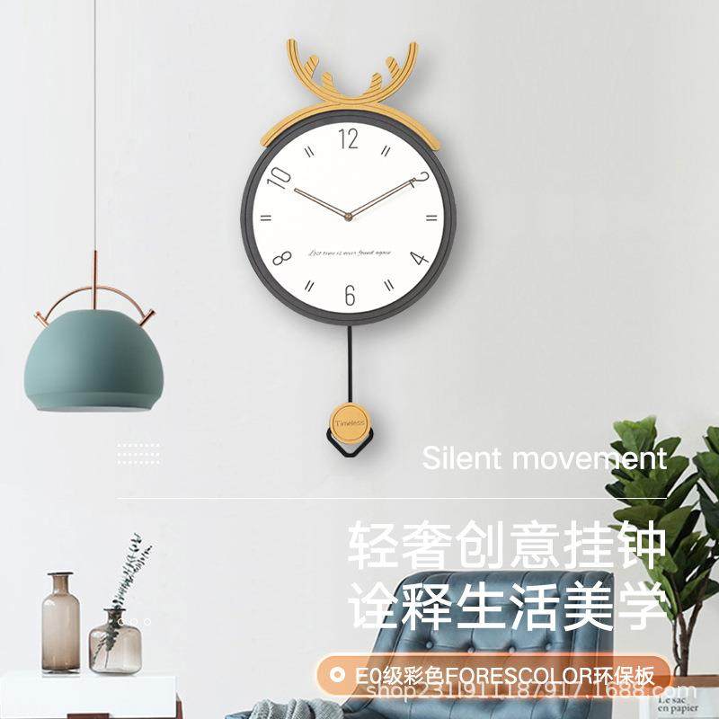 轻奢鹿角钟表现代简约摇摆挂钟玄关家用简约大气创意艺术网红时钟