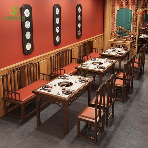 新中式国潮风湘菜馆靠墙卡座沙发主题餐饮烤肉火锅店餐厅实木桌椅