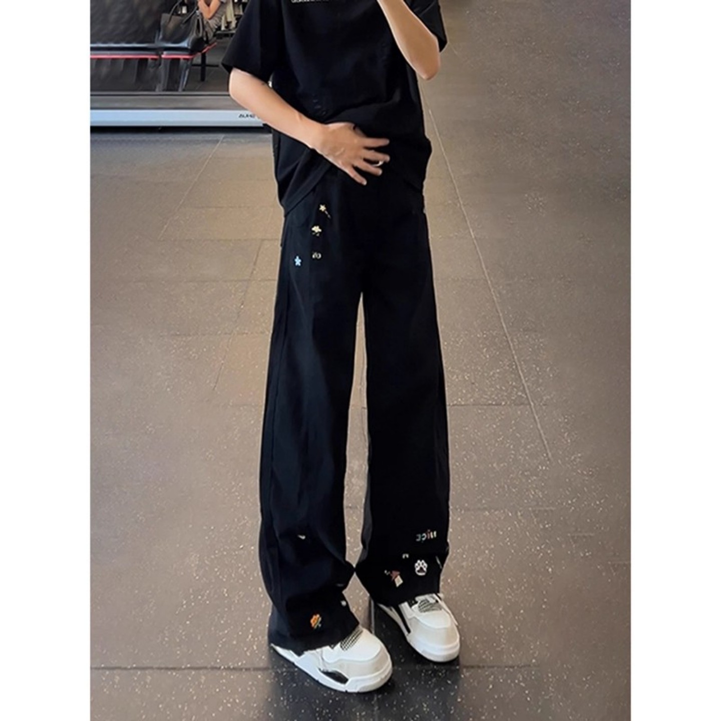 黑色趣味卡通印花牛仔裤男款美式