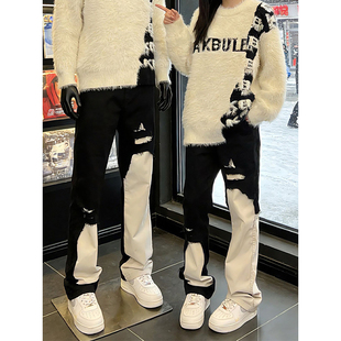 黑白拼接破洞牛仔裤男款秋冬vibe风复古裤子不规则设计乞丐微喇裤