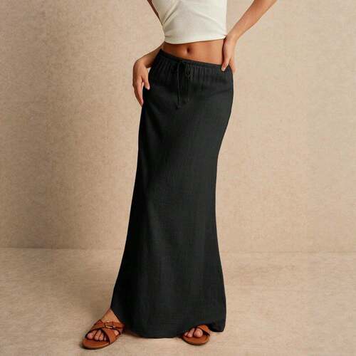 A women's white drawstring high-waist long Maxi skirt