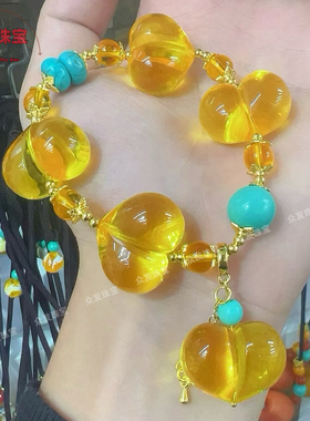 爆款金珀屁桃手链长命富贵手串女款高颜值鸡油黄琥珀浅色屁桃手串