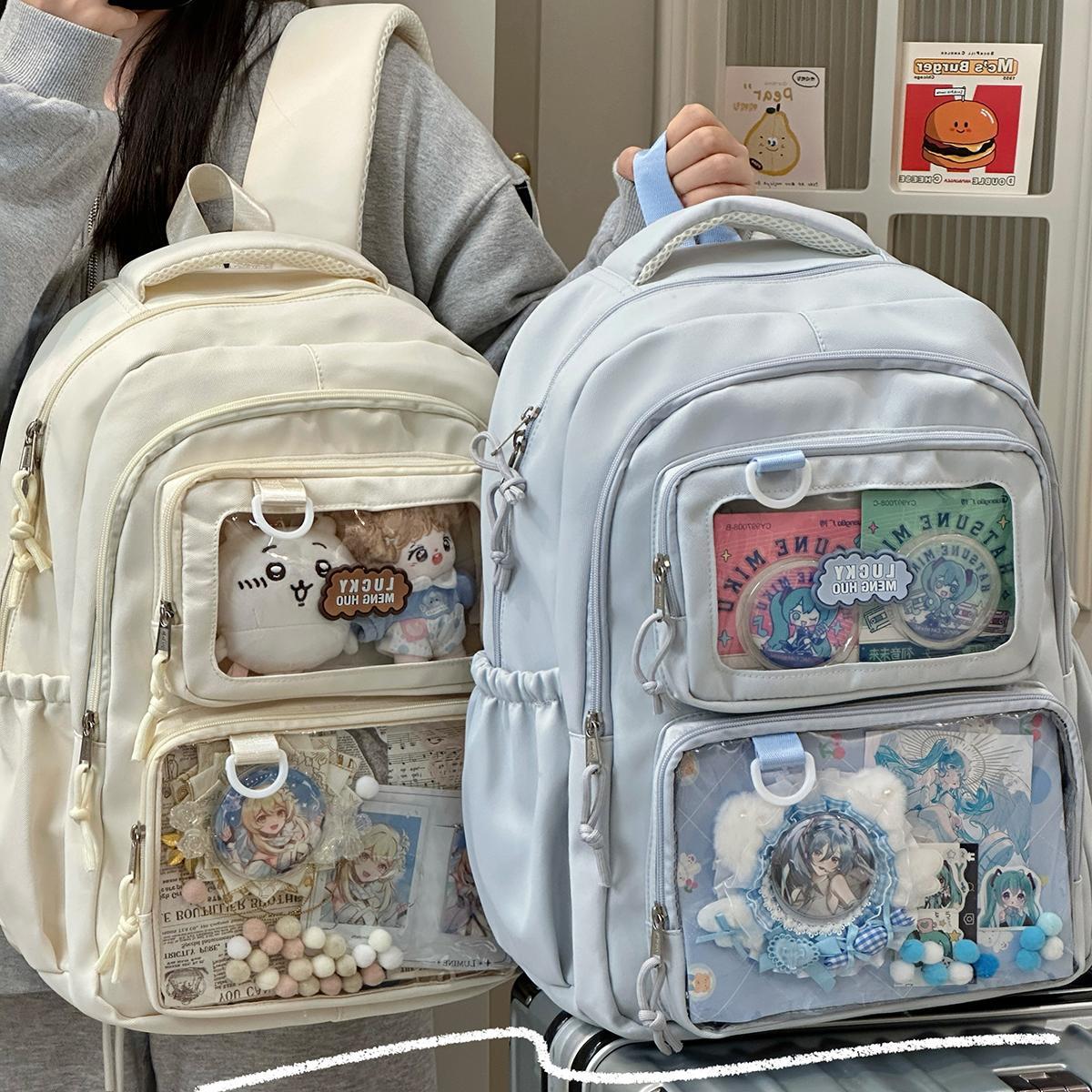 ins小众痛包二次元高颜值书包初中女生带痛层可放吧唧小卡双肩包