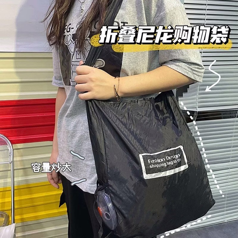 速发小圆盘迷物袋超市便携式手提袋环保折纳购你伸缩尼龙买菜包收