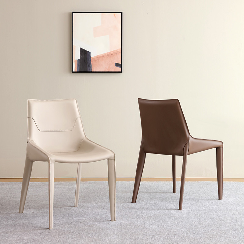 奶油风餐椅家用设计师凳子现代简约意式极简餐桌椅马鞍皮椅子轻奢