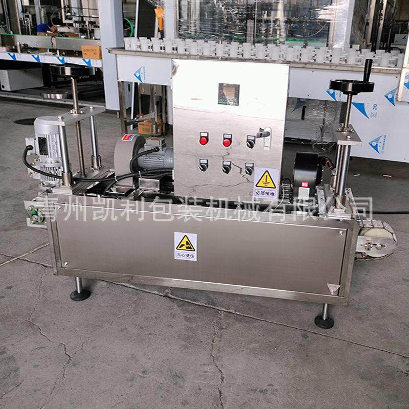 山茶油瓶口胶帽热缩机 橄榄油/核桃油/红酒塑料帽封口机 不限瓶型