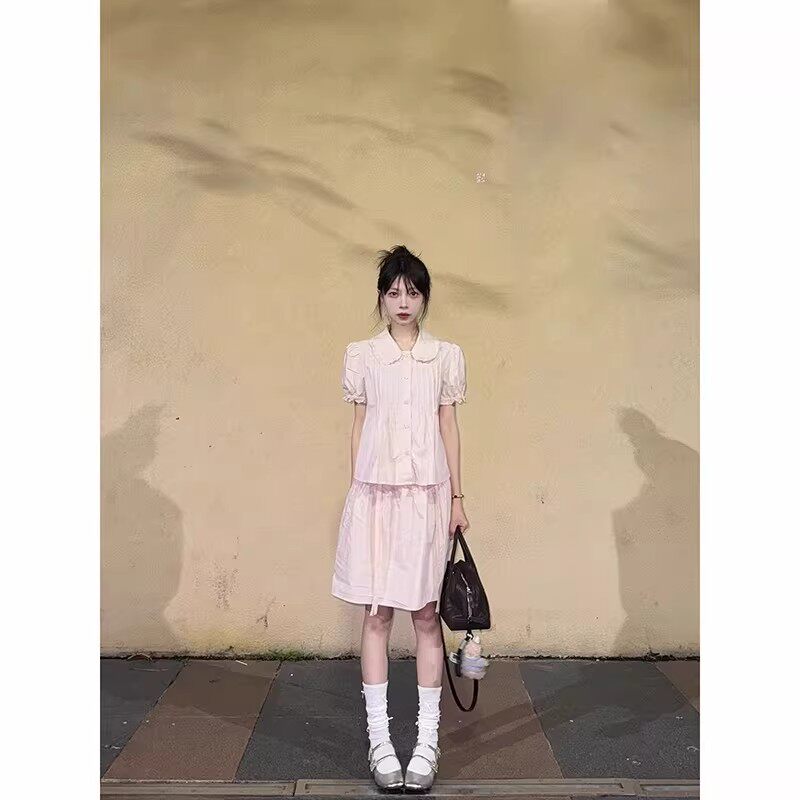 甜美少女风粉色套装女夏季新款上衣娃娃领衬衫A字半身裙一整套